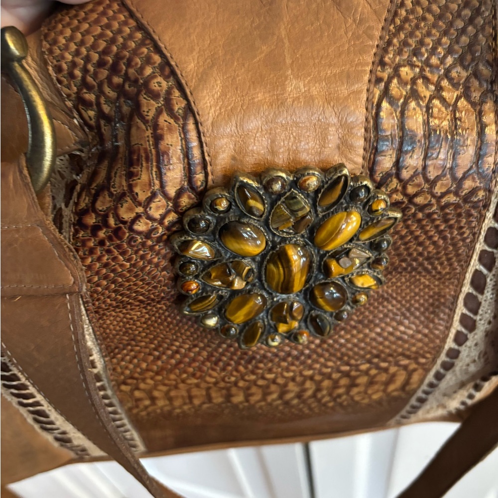 Leather rock embrossed leather bag.